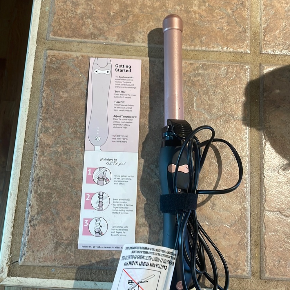 Beachwaver B1 curling iron. Rose gold and black.